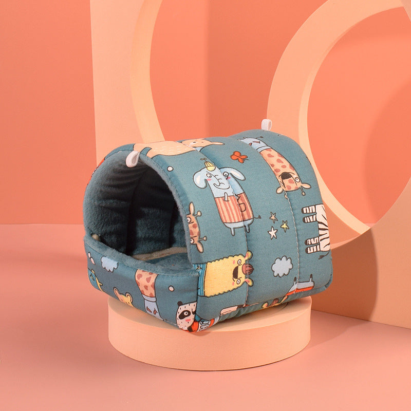 Cozy hamster nest in fun animal designs, made of soft cotton velvet, perfect for small pets.